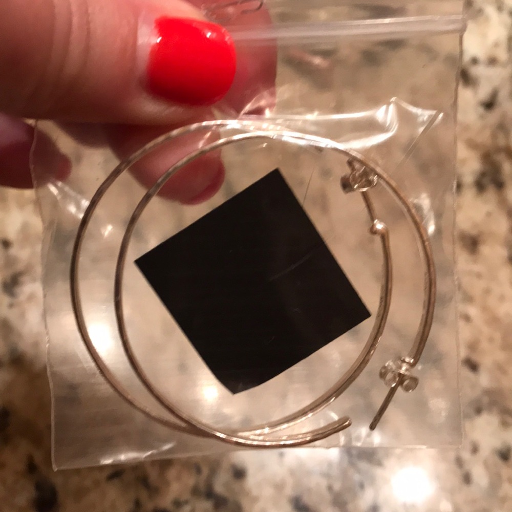 Silver hoop earrings never worn